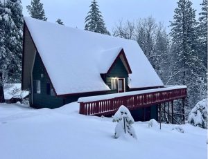 Blanket of fluffy snow over The Cozy Cub cabin